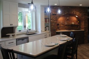 Modern Shaker White Kitchen with brick accent