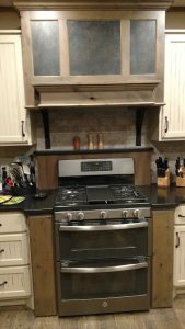 Rustic Alder Hood with Hammered Wrought Iron Inserts
