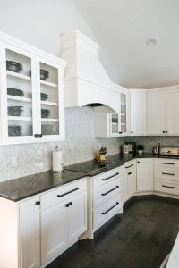 White Painted, shaker style Kitchen and Stained Island