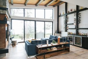 Modern Frameless Alder bar with unique custom wine bottle holder.