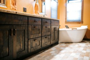 Rustic Hickory Skip Sawn Vanity stained Rustic Black with granite countertop