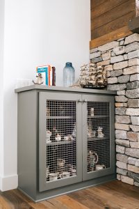 Fireplace side cabinet with wire mesh panel insert painted grizzle grey