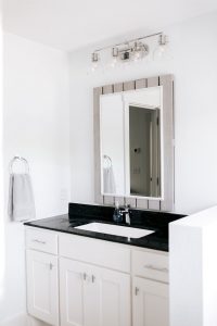 White vanity with square bowl and cultured marble top