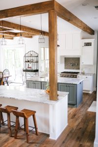 Two toned double island kitchen, Rustic Alder painted cabinets with Rub thru pecan stain and Grizzle Grey painted center Island