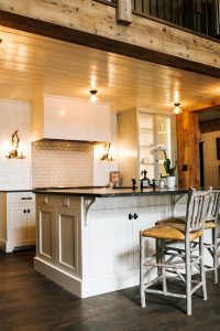 Two Toned Inset Kitchen Cabinetry with shiplap hood and painted hutch