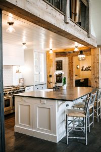 Two Toned Inset Kitchen Cabinetry with shiplap hood and painted hutch