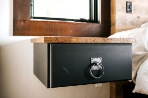 Floating night stands painted charcoal with reclaimed wood top