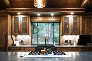 Distressed Rustic Hickory kitchen cabinets with wire mesh door inserts