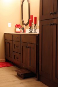 Vanity with toe kick step and linen